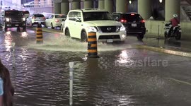 Street flooding in downtown Toronto after severe thunderstorm and torrential rain hits the city