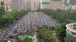 Tens of thousands of protesters turn Hong Kong's Victoria Park into sea of umbrellas