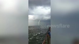 Large waterspout spotted in the sea near China's Zhuanghe