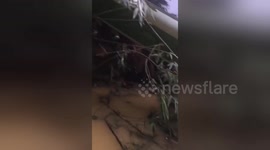 Six Chinese tourists among 13 killed after bus crashes in northern Laos