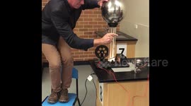 Science teacher lights fire with the tip of his finger at Australian school