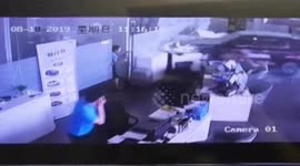 Driver slams car into garage in China after accidentally pressing the accelerator
