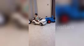 Four-year-old boy shows off incredible parallel parking skills with toy car in China