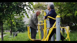 Old couple training in nature