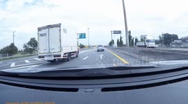 Terrifying moment wooden post hurtles though the air before hitting car on motorway
