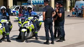 Police CRS motorbikes at the Grande Plage Biarritz With Le Palais in vieww
