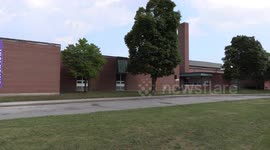 Toronto high school with LGBT rainbow pride flag promoting inclusion of all students
