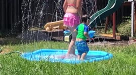 Older sis kicks baby bro