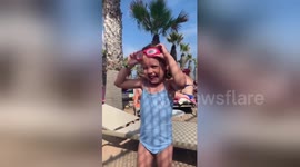 Adorable moment UK girl couldn't find her goggles that were on her head the whole time