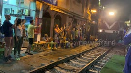 Tourists flock to Train Street in Hanoi, Vietnam