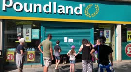 Poundland customers crawl under jammed security door