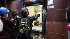 Hong Kong protesters destroy property they believe belongs to triad gangsters