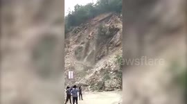 Frightening moment huge boulders, triggered by landslide, fall off cliff; bring traffic to halt in northern India