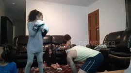 7-year-old fighter floors her dad with tricky shot during training