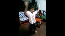 Girl bites her pet dog when it keeps annoying her