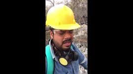 Indian Volunteer explains how to fight fires while 747 plane tanker flies above him