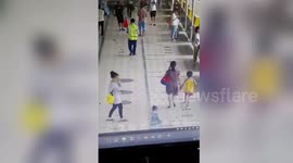 Bus narrowly avoids commuters after smashing into waiting room in China