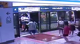 Woman in Singapore narrowly misses train then opens safety doors with her bare hands to climb inside