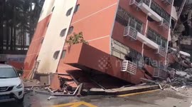 Six-storey residential block topples over onto another building in China's Shenzhen