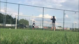 'One in a million shot!' Belgian teenager accidentally kicks football into window of moving car