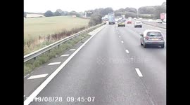 Dashcam catches near miss as UK car pulls out in front of speeding truck