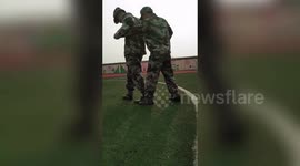 Chinese student is unable to coordinate his arms and legs during military training drill