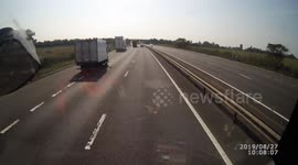 Lorry fails to stop after smashing into parked truck on UK motorway