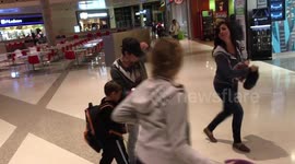 Family Pillow Fight in Airport
