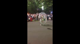 Woman shakes 50 large metal hoops on her body in Vietnam