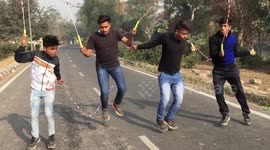 Youths sync up moves, display acrobatic skills on jumping ropes