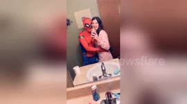 Newsflare Edit - Spider-Fail! Hilarious moment boyfriend dressed as Spider-Man fails cool pose and sticks foot in toilet