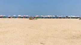 Tourists Gathered Up In Ras El Bar Beach , Morning Sunny Day