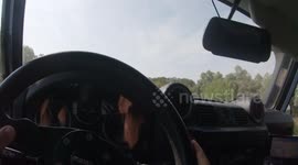 a  car driving on the motorway from the point of view of the driver