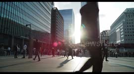 rush hour commuters heading home in london docklands