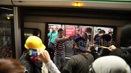 Confrontation between pro and anti-government groups on Hong Kong MRT