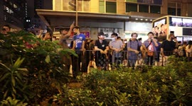 Hong Kong Anti Extradition Protest 1st September 2019. Angry residents gather outside Mong Kong Police Station showing their angry at police who take cover behind a net to protect from projectiles