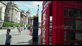 red london telephone box at trafalgar square