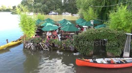 Pub-goers stranded in beer garden by tidal flooding in west London