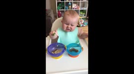 UK baby gives disgusted reaction as she tries spinach for the first time