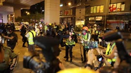 Intense scenes as Hong Kong police forcefully remove journalists covering protests at station