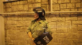 Harrowing moment Hong Kong police officer and journalist both feel terrible effects of tear gas