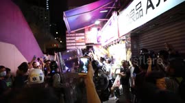 Newsflare Edit - Hong Kong Police move in to make an arrest because a young boy shouted profanities at police