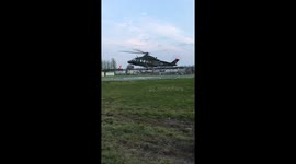 Irish military helicopter hovering and taking off in Galway Ireland