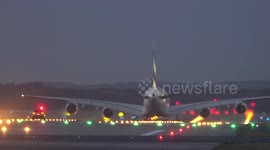 Rare moment plane spotter captures car 'chasing' aircraft at German airport