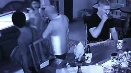 CCTV captures theif 'stealing cash' from British tourist's bag as he plays pool in Thailand