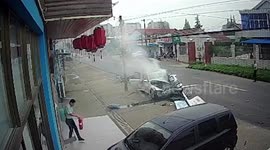 Car crashes into utility pole sending sparks flying onto road in China