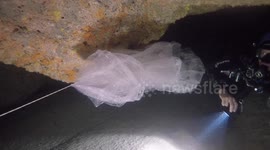 Cave divers find huge sheet of plastic floating deep in ocean off the Bahamas