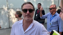 Joaquin Phoenix signs autographs at Venice Film Festival