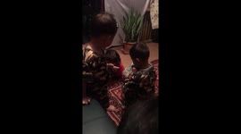 Cute baby’s feeding each other