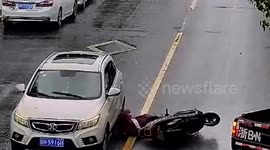 Scooter rider saved by helmet after car runs over her head in China